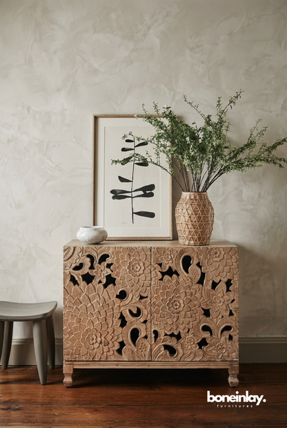 Solid wood storage lotus cabinet featuring dual doors with oversized, deeply hand-carved floral lotus cut-out patterns in a warm honey-toned finish.