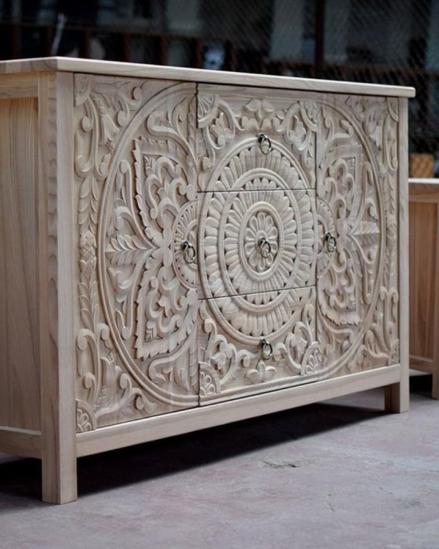 Mandala Ring-Pull Storage Server in rustic solid wood, front view from the left showing floral carving and paneled side.