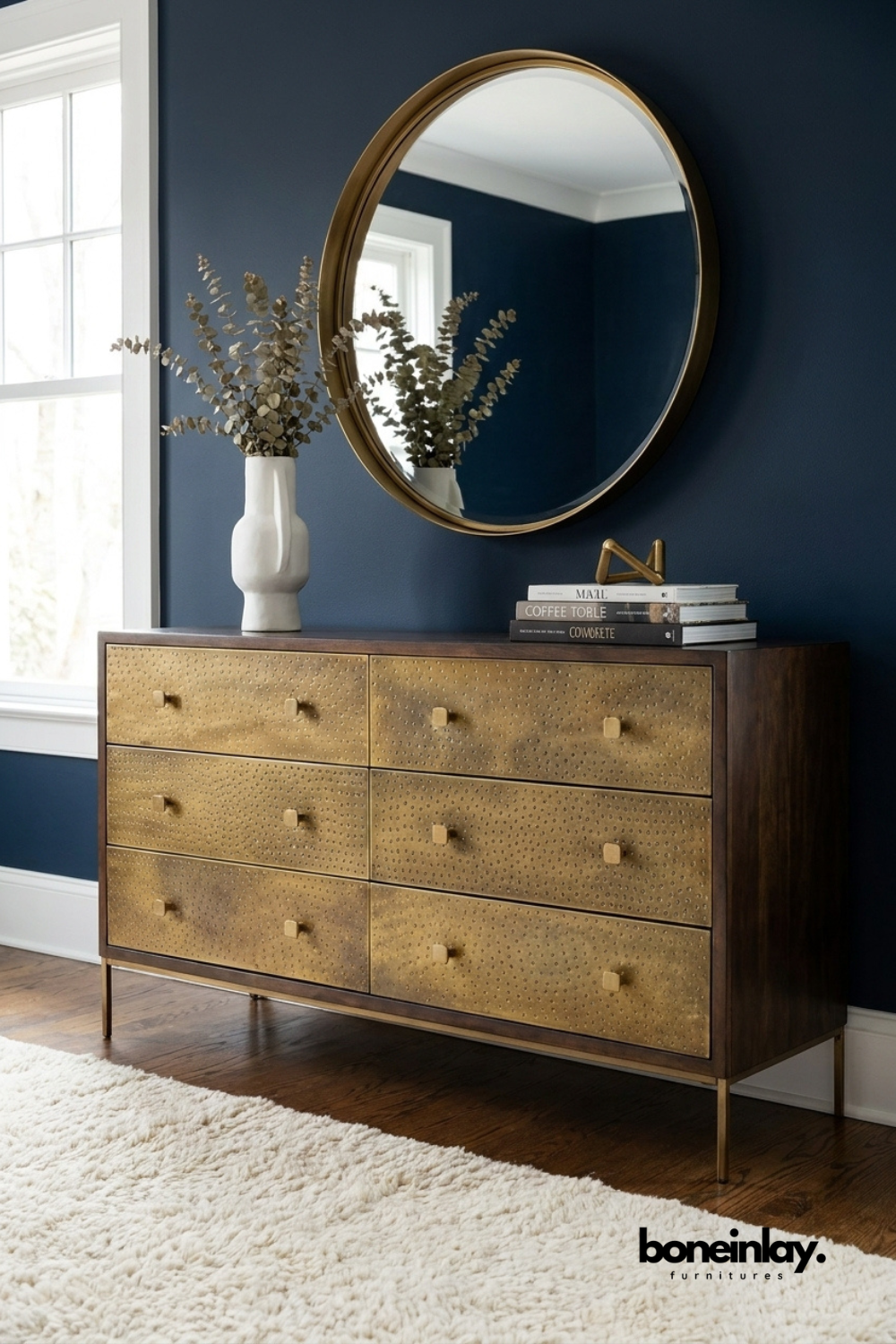Handcrafted brass embossed six drawer dresser with textured metal drawer fronts, solid wood frame, slim brass legs, and luxurious bedroom storage cabinet.