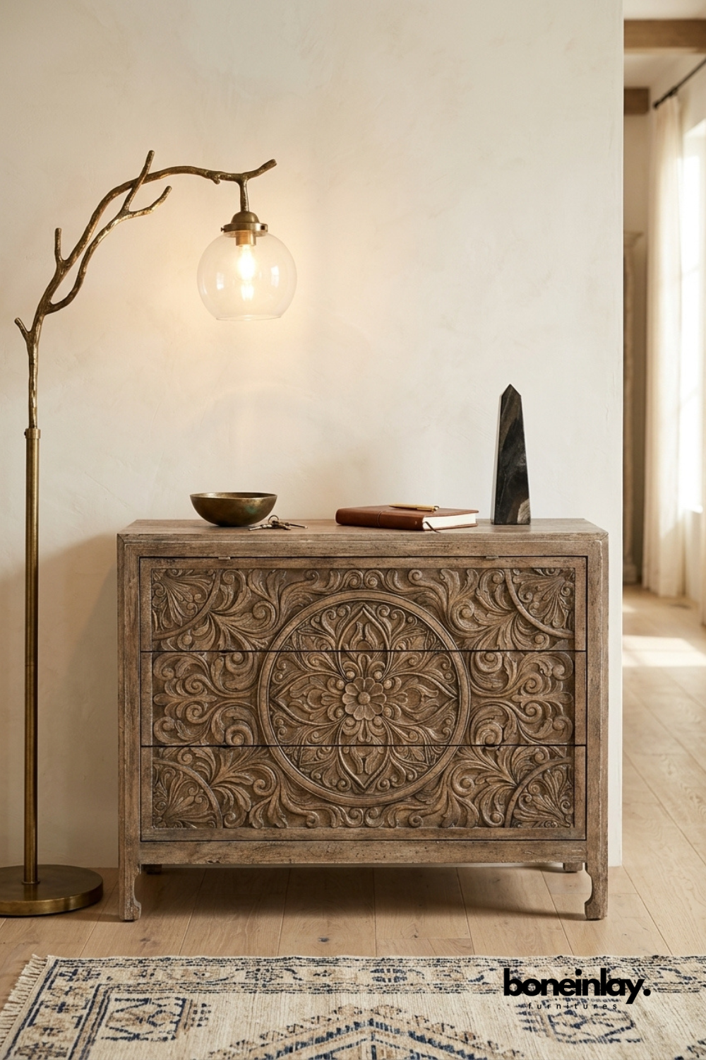 Handcrafted solid wood three drawer dresser featuring intricate floral medallion hand carved drawer fronts, rustic finish, and artisan bedroom storage furniture.