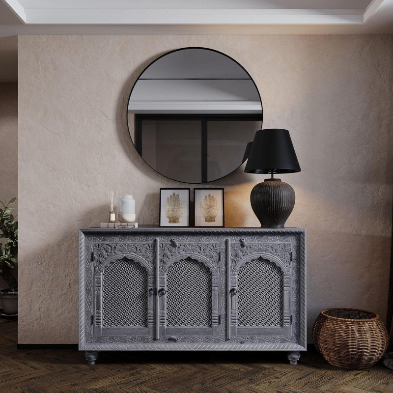 Front view of the Maven Lane Patrin Handmade Heritage Wooden Sideboard  featuring distressed grey solid wood and three arched Jali doors.