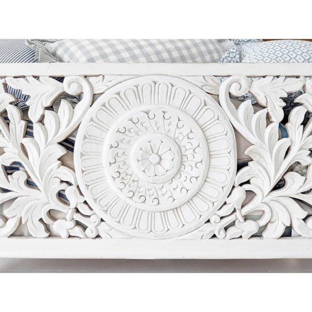 Medallion Carved Storage Chest in white wood, close-up of carved detail showing a floral rosette and curling leaves.