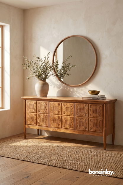 wooden sideboard featuring geometric hand-carved drawer fronts, warm natural wood tones, and clean Scandinavian styling.