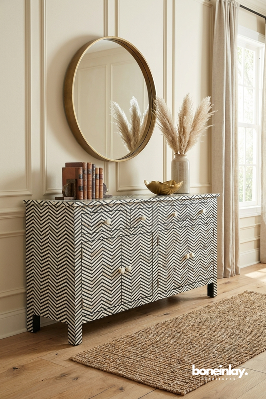 Chevron bone inlay sideboard featuring black and white geometric pattern with multi drawer storage.