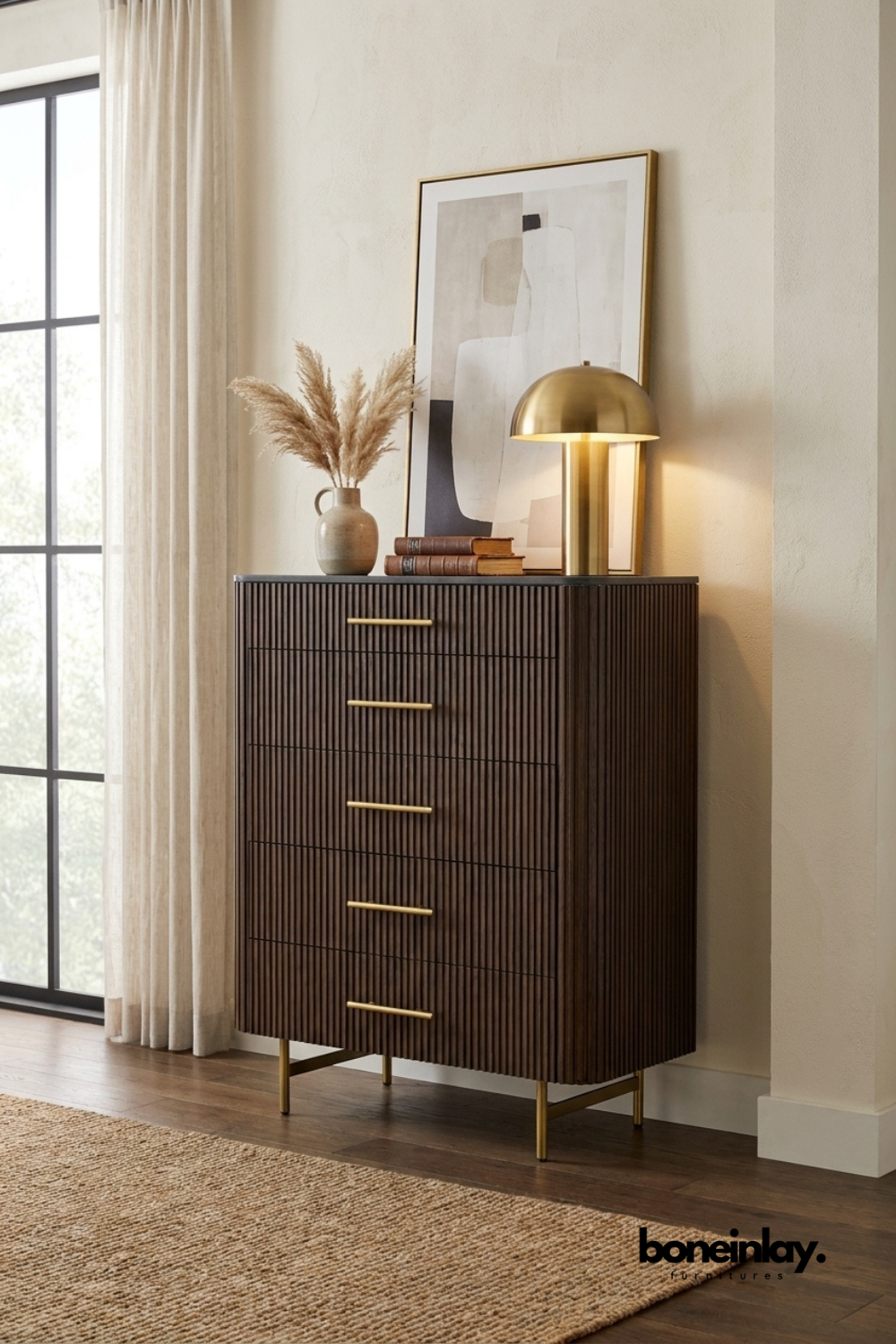Modern fluted walnut chest of drawers with vertical ribbed detailing, five spacious drawers, brass handles, slim metal legs, and contemporary handcrafted bedroom storage furniture.