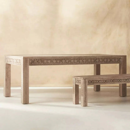 Natural teak farmhouse table and bench set, side profile view against plain background.