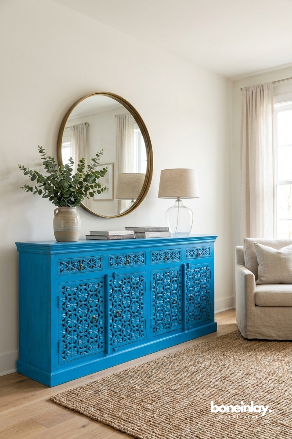Vibrant blue handcrafted buffet featuring intricate lattice carvings and eye-catching statement color.