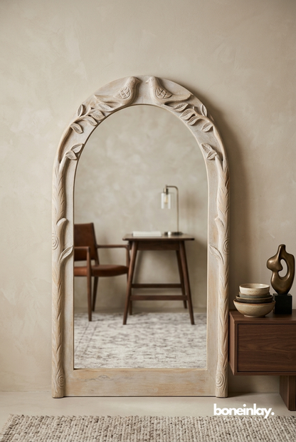 Hand Carved Wooden Arch Mirror with Bird Motif Frame in Minimal Warm Neutral Interior