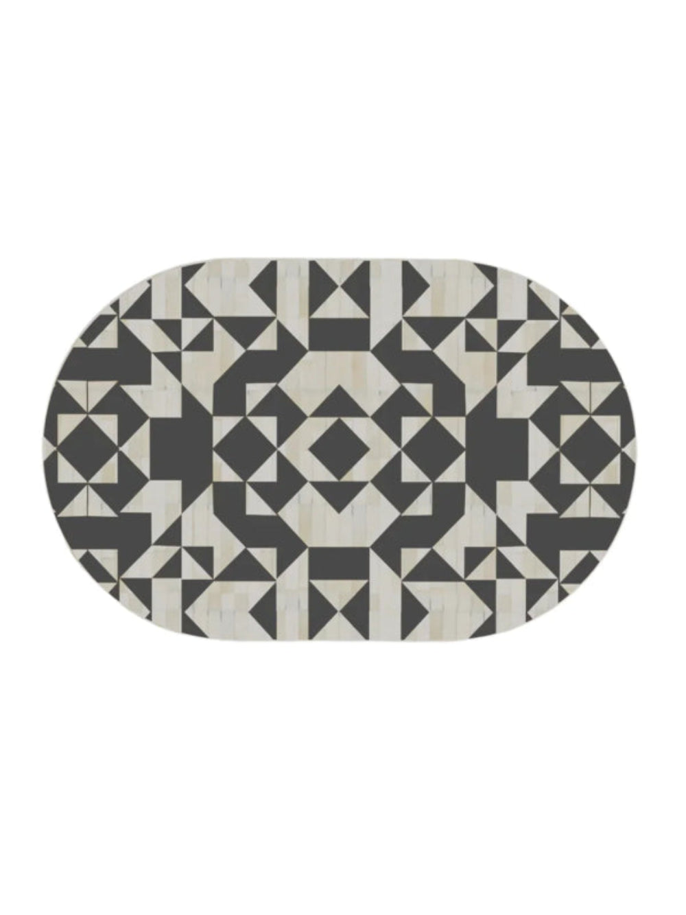 Overhead view of oval bone inlay coffee table top with symmetrical black white geometric inlay pattern luxury artisan furniture