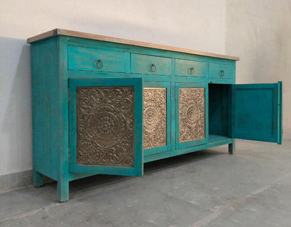 Patterned teal server with a door swung open, shown at an angle with its cabinet interior partly visible.