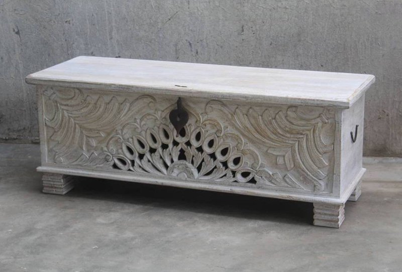 Peacock wooden hope chest with a rustic finish, front view showing the right side handle and carved feather design.