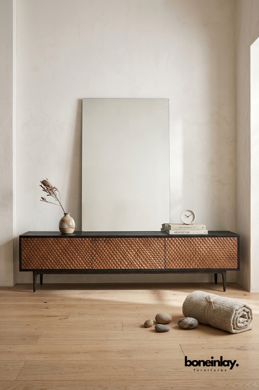 Modern textured wood media console with geometric carved drawer fronts, black metal frame, and minimalist design for contemporary living room storage.