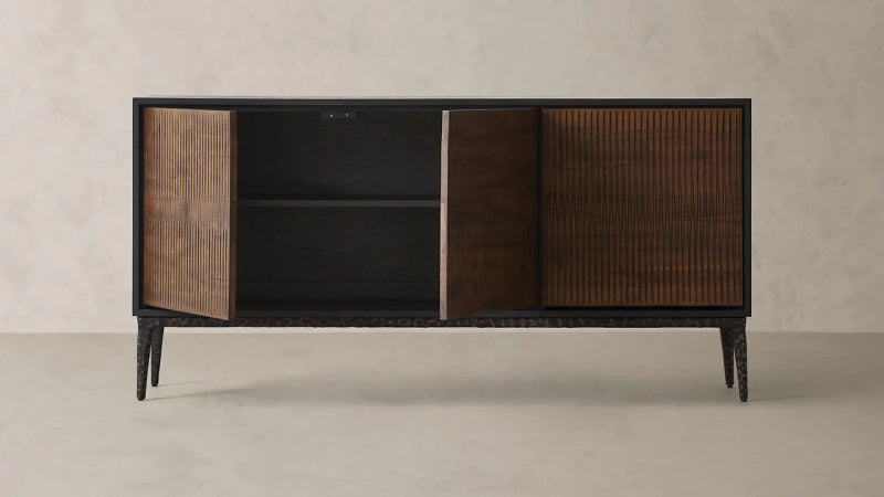 Phoenix buffet cabinet featuring three wood doors, sleek metal framing, and compact Scandinavian design.