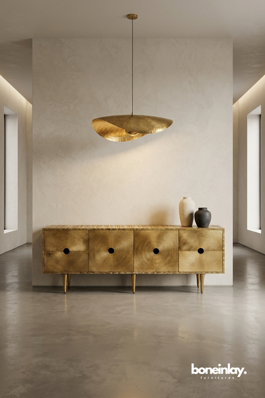 Gold textured drawer sideboard cabinet with concentric circular pattern fronts and metallic finish