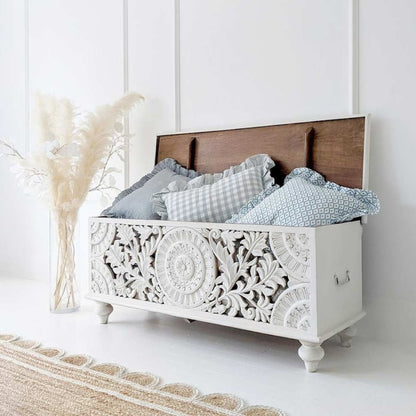 Rectangular Botanical Hope Chest in white wood, angled front view with raised lid, stored cushions and a side handle.