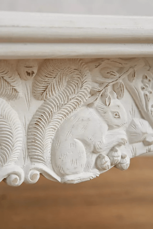 Rustic Farmhouse Menagerie solid wood kitchen table in a rustic finish, edge detail view showing an animal relief below the top.