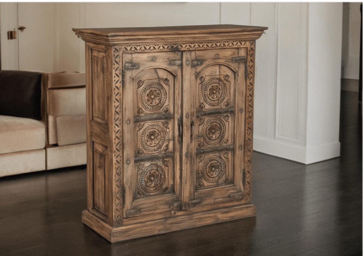 Rustic mango wood sideboard with carved doors, front view showing full piece.