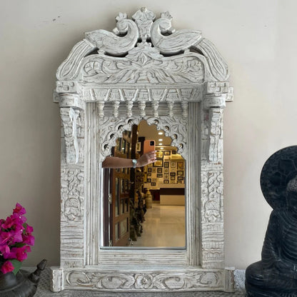 Rustic Peacock Wall Mirror in hand-carved solid wood, front view showing twin birds and a scalloped inner arch.