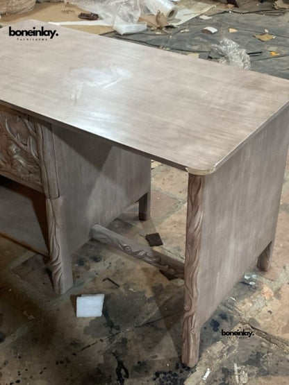 Rustic wood writing table, close-up of leg and corner joint detail.