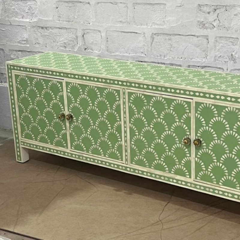Sage green scalloped bone inlay storage cabinet with 4 doors and brass knobs, showing inlay detail on top surface and front panels
