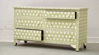 Sage green bone inlay dresser with one open drawer showing interior, floral honeycomb pattern and round knobs