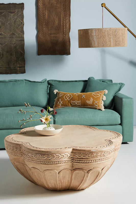 Scalloped hand-carved coffee table in light-washed solid wood with a lotus petal edge and chiseled border detailing