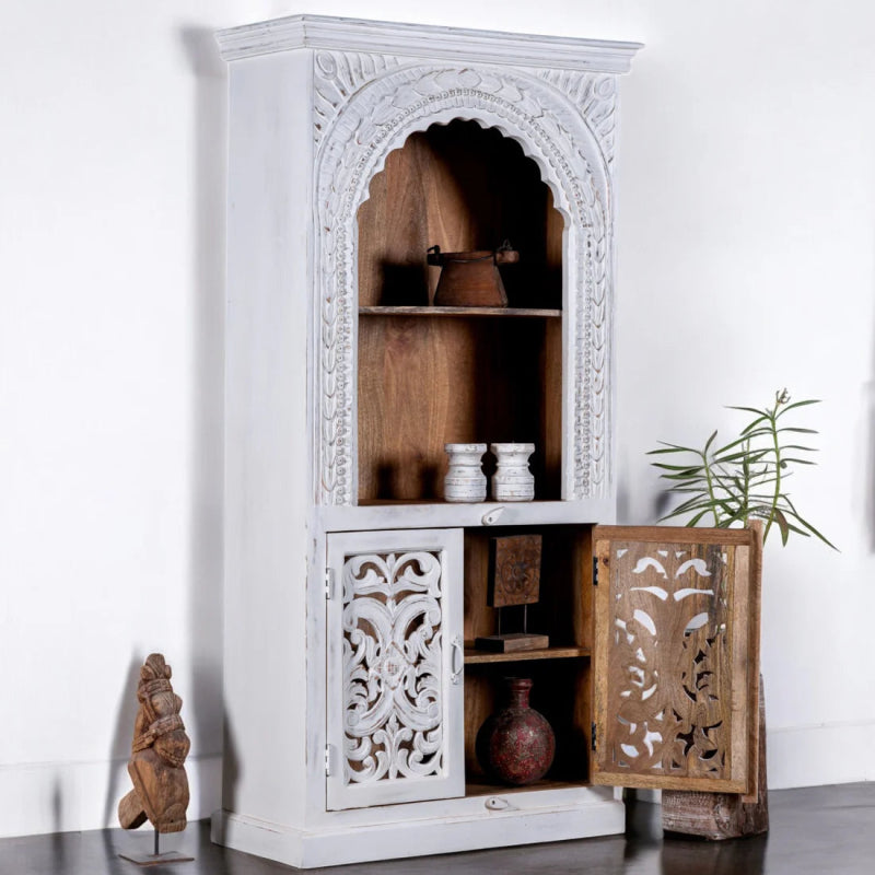 Scalloped wood storage cabinet with a rustic finish, front view at an angle with one door open to lower shelves.
