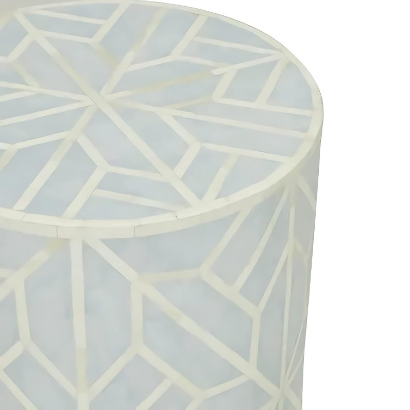 Close-up detail of sea green bone inlay drum table showing precision geometric star inlay craftsmanship on the surface and rim