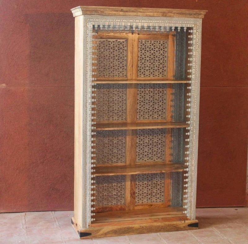 Solid wood open bookshelf, front view showing four shelf tiers, geometric fretwork panels and rustic carved trim.