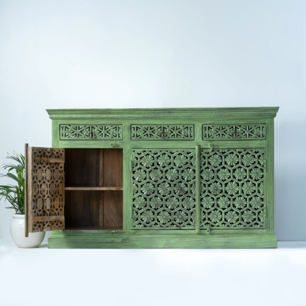 Solid wood carved  storage buffet in sage green, front view with the left door open to reveal a natural wood interior shelf.