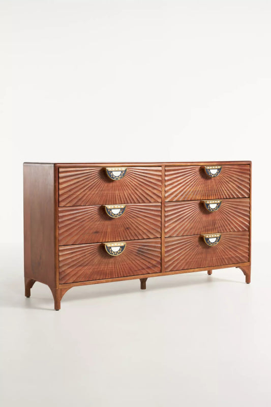 Tapered Leg Credenza in walnut wood is shown from the front left, revealing its side panel, six drawers, and brass pulls.