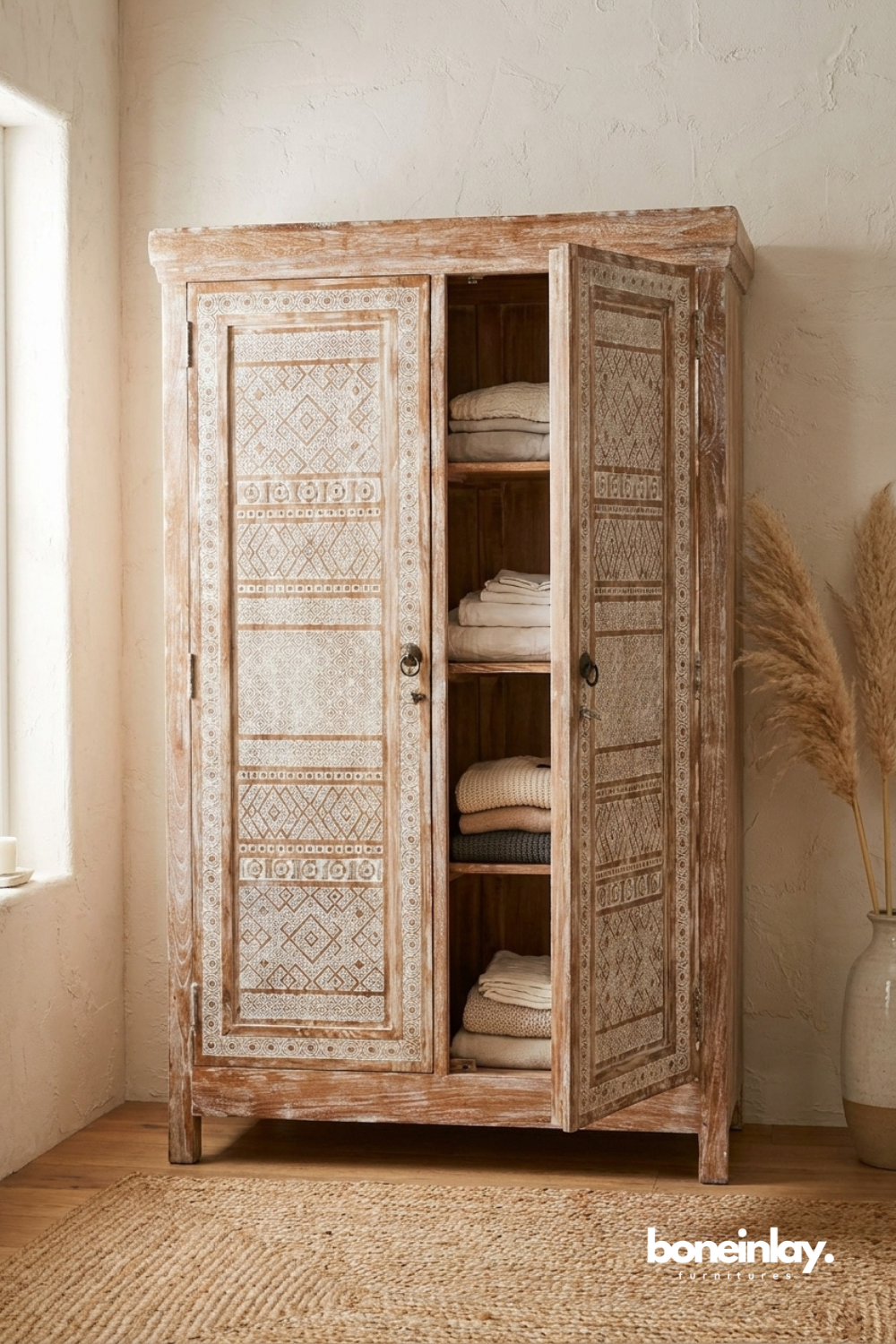 Bohemian Whitewashed Wooden Armoire with Intricate Tribal Pattern Doors