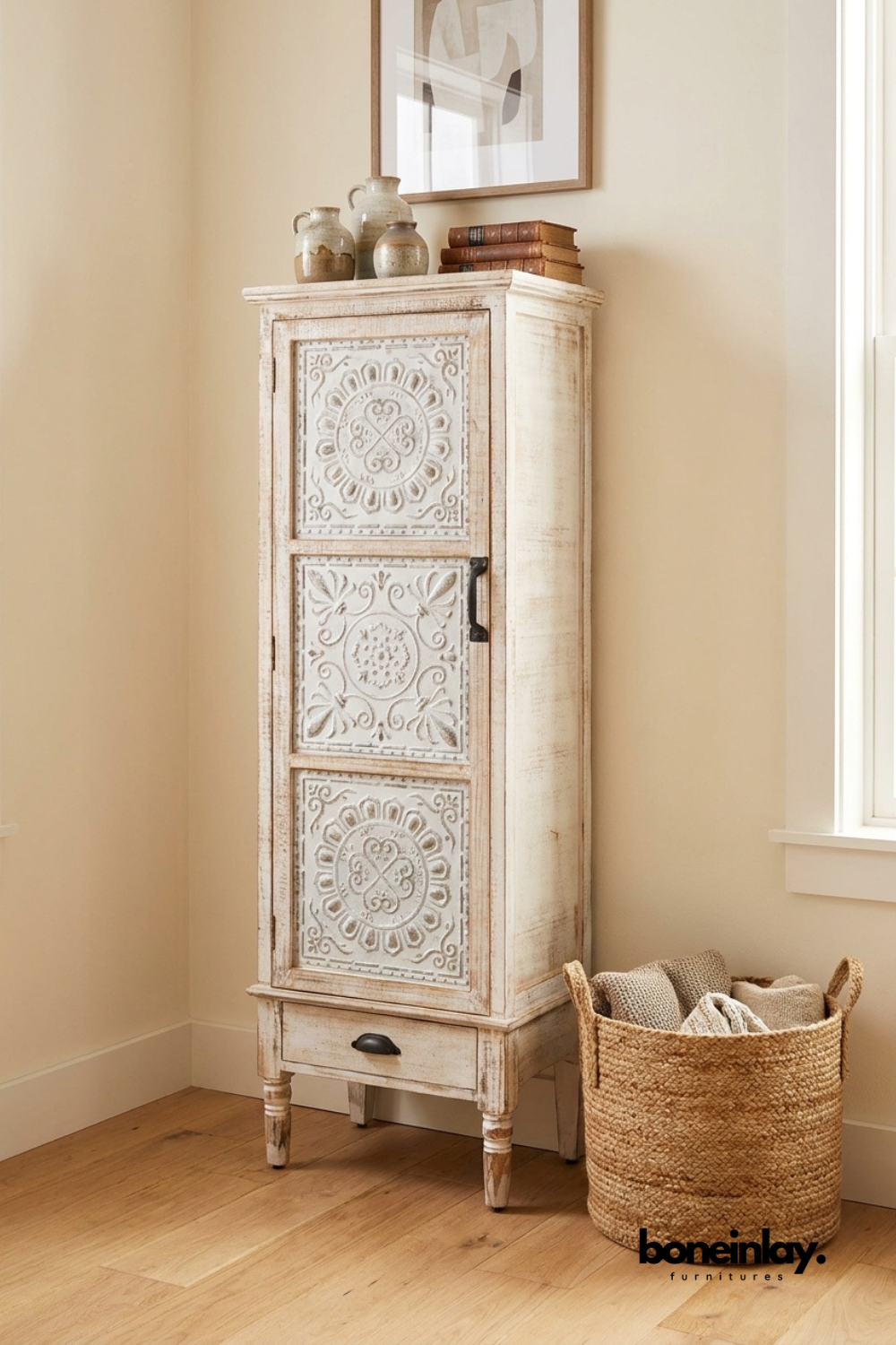 Distressed white carved solid wood tall storage cabinet featuring hand carved floral door panels, single drawer, spacious interior shelving, and rustic farmhouse accent furniture.