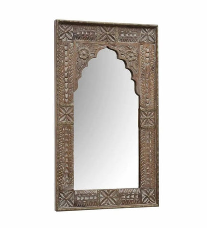 Weathered wood accent mirror with a scalloped opening, front view at a slight angle showing the carved frame depth.