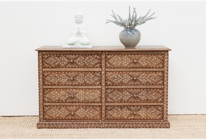 Handcrafted solid wood 8-drawer bone inlay dresser featuring intricate white floral vine inlay patterns, geometric borders, and carved knobs.