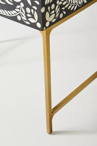Close detail of gold brass metal legs and bone inlay border on handcrafted Indian bar cabinet – artisan woodwork