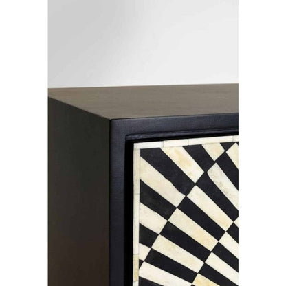 Close detail of handmade black and ivory bone inlay optical pattern on bar cabinet corner showing intricate tile work and black mango wood frame