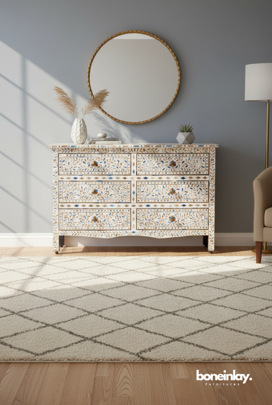 Handmade bone inlay floral vine six-drawer dresser styled in a modern bedroom with round mirror and neutral decor, crafted in Rajasthan India.