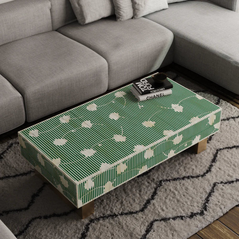 Handcrafted rectangular bone inlay coffee table in emerald green with white floral motifs and solid brass legs — premium artisan living room decor.