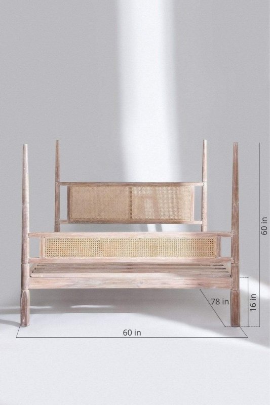 Handmade caned bed with a four-poster canopy frame.