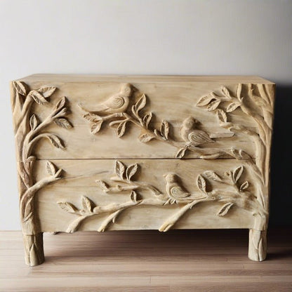 Natural-finish two-drawer wood dresser with a carved bird and branch design