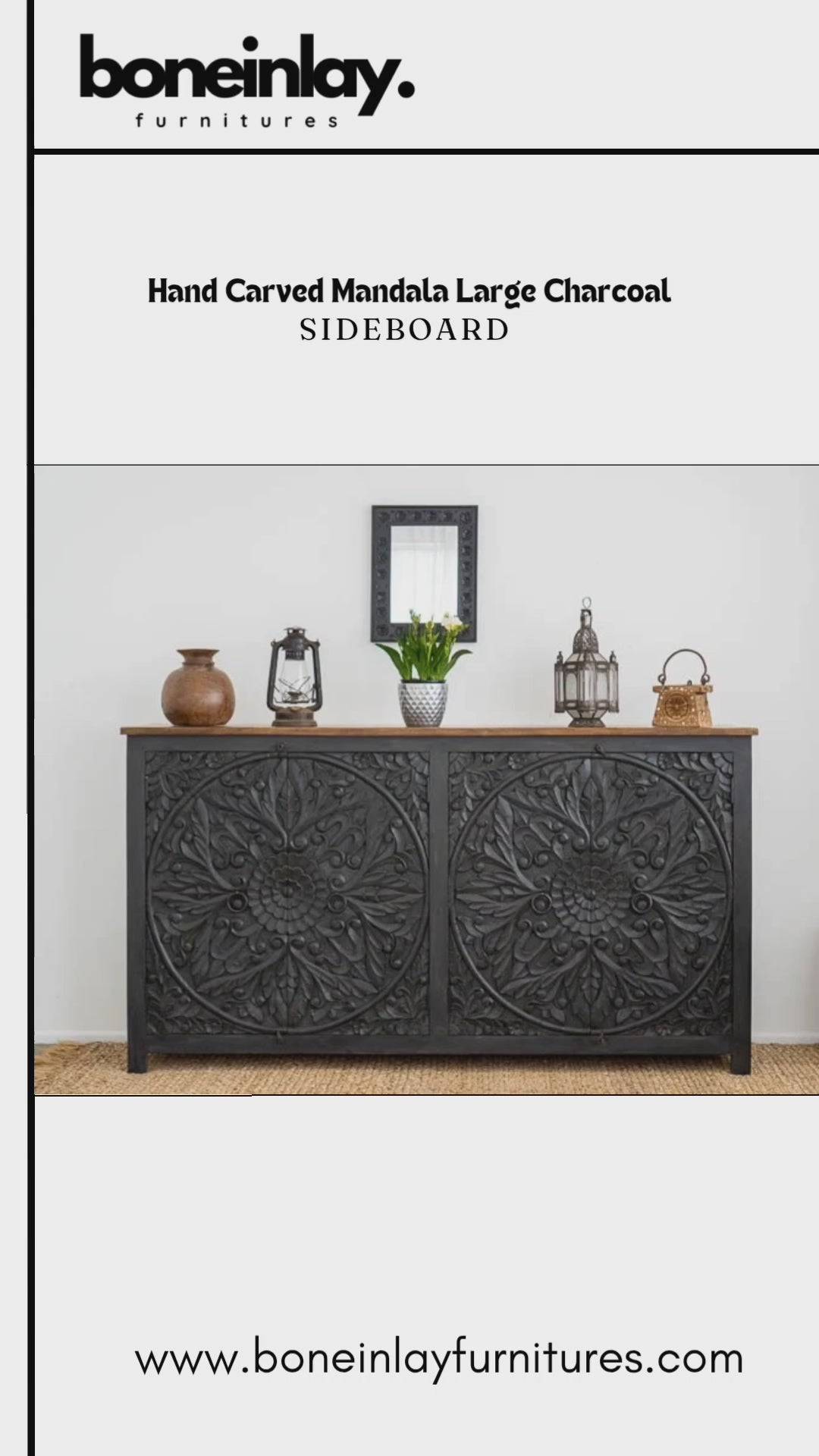Black wooden mandala credenza video preview showing a front view of the carved floral doors, circular ring pulls and natural wood top, styled with decorative lanterns and pottery beneath a framed portrait.