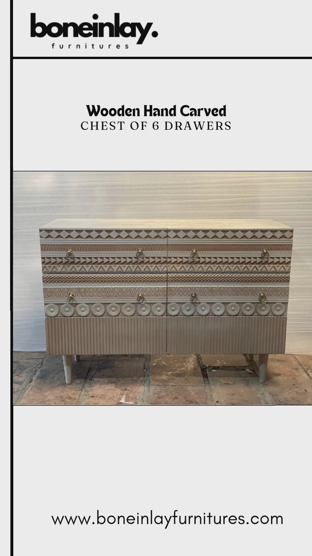 A wide, six-drawer wooden chest with intricate hand-carved geometric patterns on the drawer fronts. The light wood finish is accented by circular gold ring pulls and sits on four tapered white legs. The design features alternating rows of diamond, zigzag, and floral-inspired carvings