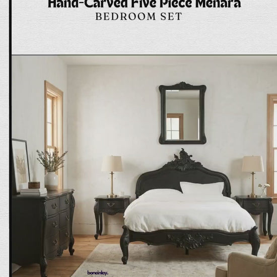 A cinematic presentation of the Hand-Carved Five-Piece Menara Bedroom Set in a sophisticated matte black finish. The collection features a majestic queen-size bed frame with an intricate, hand-sculpted Rococo-style headboard and a matching carved footboard. The set includes a grand eight-drawer double dresser with elegant curved fronts and brass-toned hardware, a coordinated hand-carved wall mirror, and two single-drawer French Provincial nightstands on classic cabriole legs. Each piece showcases high-relie