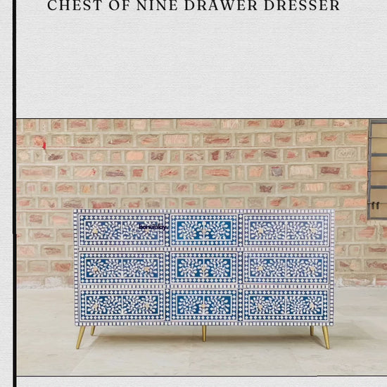 The video showcases a Luxurious Handmade Bone Inlay Chest of Nine Drawers. It features an intricate floral and leaf pattern in white against a deep blue background, accented with elegant gold-finished hardware and tapered legs. The clip highlights the artistry of the piece, showing a drawer opening to reveal a vibrant blue interior. It concludes with information on worldwide delivery and customization options available at boneinlayfurnitures.com.