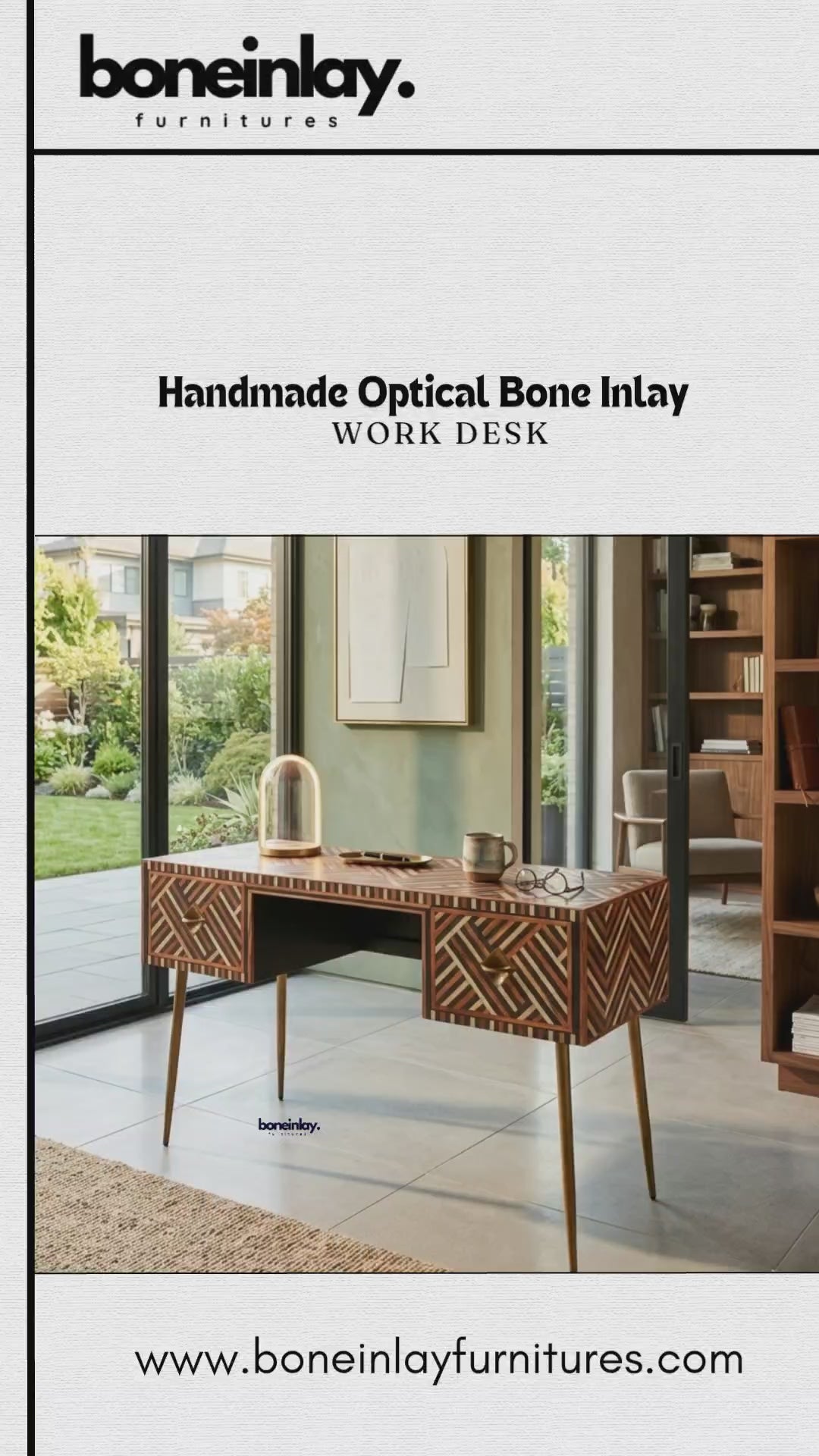 An elegant, handmade work desk featuring an intricate "optical bone inlay" pattern. The desk showcases geometric striped patterns in shades of black, cream, and warm wood tones across its top and drawers. It features slender, tapered gold legs and two built-in drawers with circular gold handles.