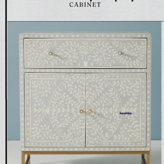 Scroll Vine Entryway Cabinet in gray bone inlay, shown in a video with the drawer and doors opening to reveal storage.