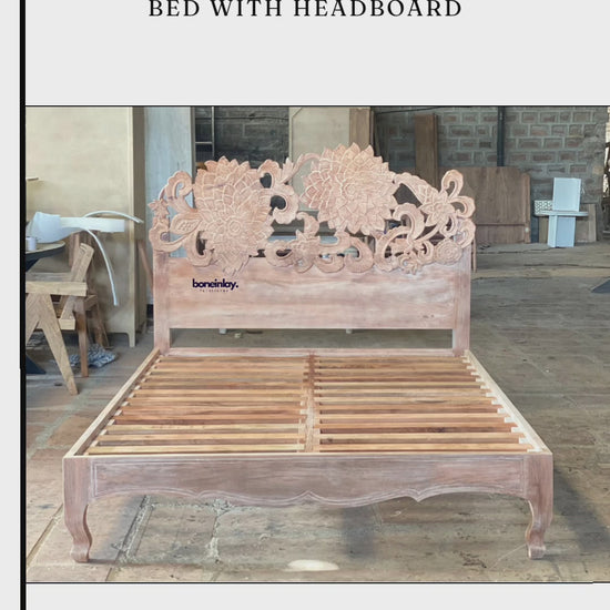 A showcase video of a "Natural Hand Carved Lotus Platform Bed." The video begins with close-up shots of the deep, 3D relief carving on the headboard, highlighting the petal textures and artisan chisel marks. It then pans out to show the full queen-size platform frame in a workshop setting. The wood has a light, raw finish, emphasizing the organic grain. The design includes a sturdy slatted support system and elegant, scalloped side rails that lead into subtly curved legs.