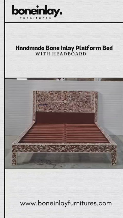 The "Handmade Bone Inlay Platform Bed" is a stunning statement piece, featuring a rich, dark-toned backdrop accented by an intricate, hand-carved white floral vine pattern that runs across the entire headboard and footboard frame. The design seamlessly blends traditional artistry with a clean, contemporary silhouette, creating a luxurious and sophisticated aesthetic. Its sturdy platform construction offers a perfect balance of durability and elegant design, making it a beautiful focal point for any bedroom.
