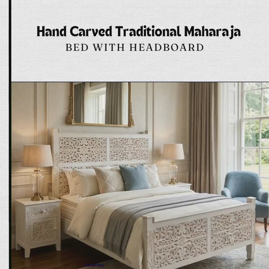 A promotional video showcasing a "Hand Carved Traditional Maharaja Bed with Headboard" from Bone Inlay Furnitures. The white wooden bed frame features intricate floral and geometric open-work carvings on both its tall rectangular headboard and matching footboard. It is shown staged in a modern bedroom setting with neutral tones and outdoor courtyard footage highlighting its unpolished wooden slat foundation.